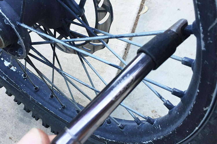 Using a good quality spoke wrench makes a ton of difference in not rounding the nipples. To achieve the proper torque on the spokes Fasst Co. makes a spoke torque wrench that is awesome. 